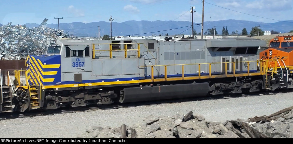 CN 3957 sports a neat scheme out at BNSF's Kaiser Fontana yard